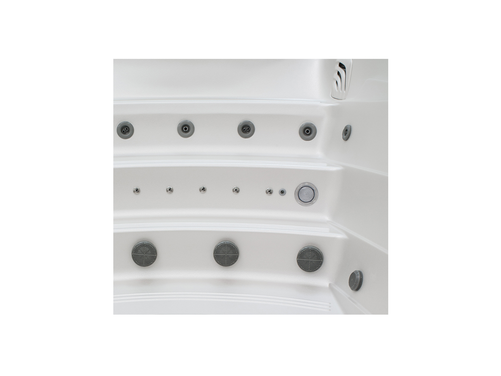 Innenansicht eines Premium-Whirlpools von ActiveSpa mit diversen Massagestrahlern und Lautsprechern für hydrotherapeutische Entspannung und ein modernes Spa-Erlebnis.